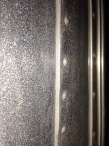 Seam has gray sealant